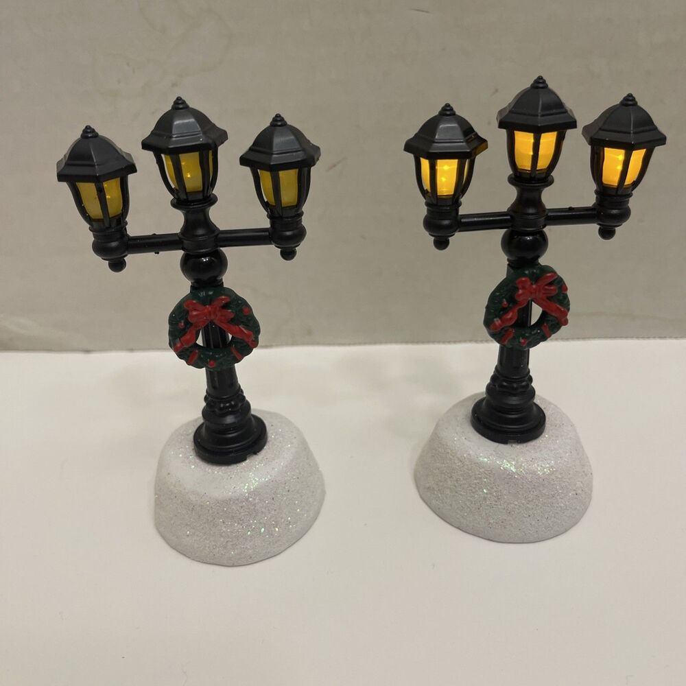 2 Christmas Village Celebrations by L&C Triple Lamp Posts Lighted 4.75" high